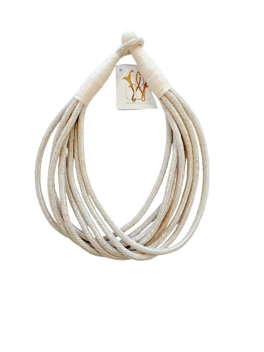 Cream multi-strand twisted rope necklace with wrapped closure.
