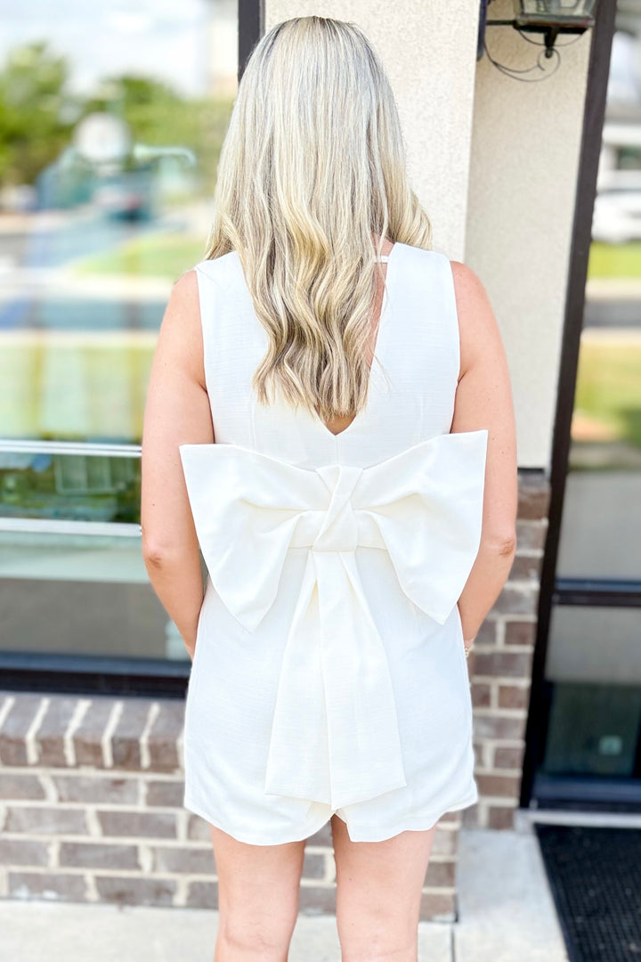WHITE BOW BACK ROMPER