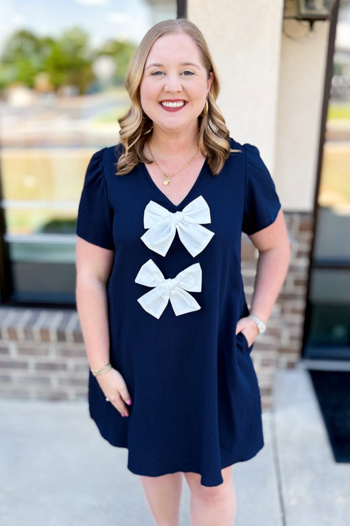 NAVY & WHITE BOW FRONT VNECK DRESS