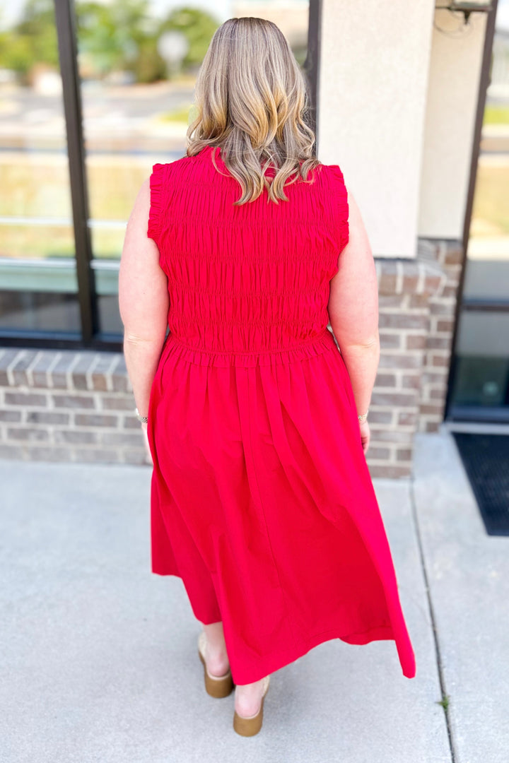 RED SLEEVELESS SMOCKED TIE FRONT MIDI DRESS