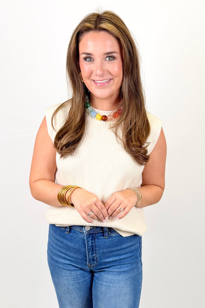 CREAM RIBBED SLEEVELESS SWEATER