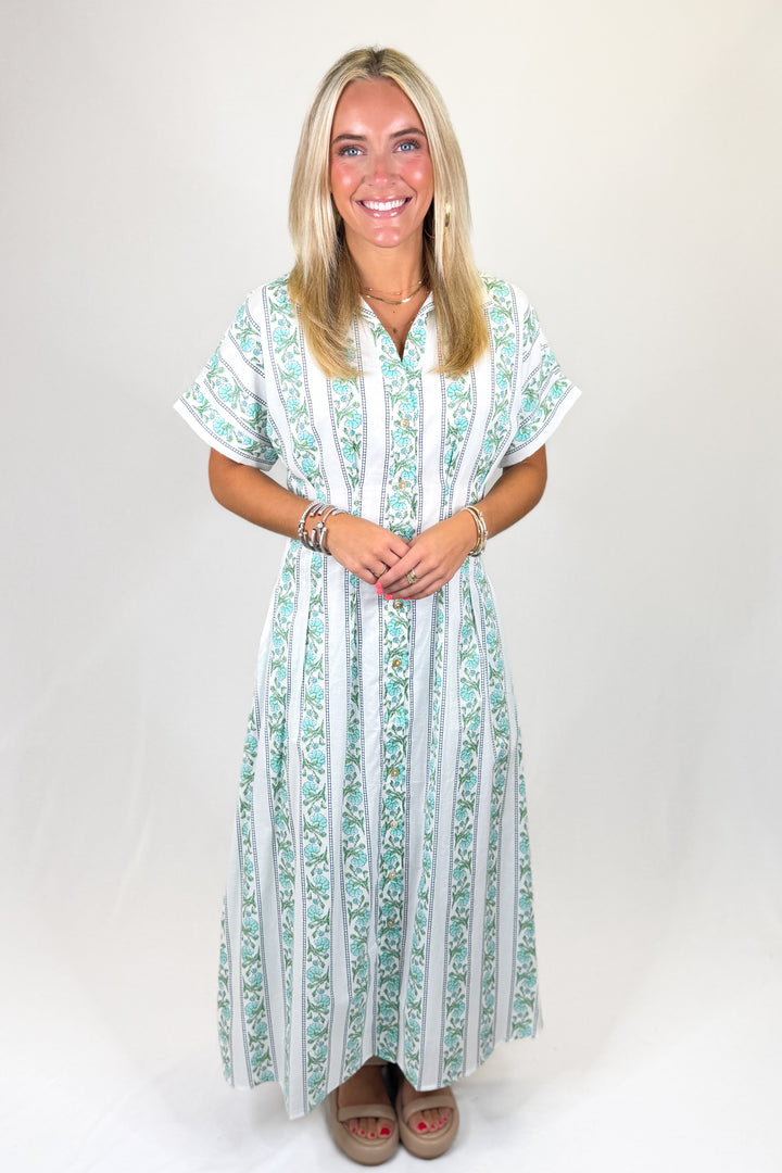Green and white floral striped maxi dress with short sleeves and relaxed fit