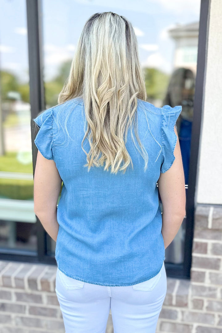 CHAMBRAY RUFFLE SHOULDER VNECK TOP