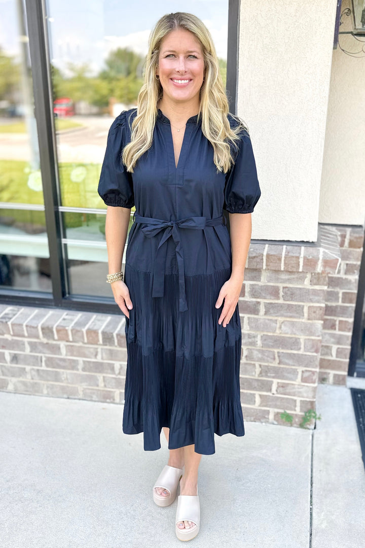 NAVY PLEATED TIERED BELTED MIDI DRESS