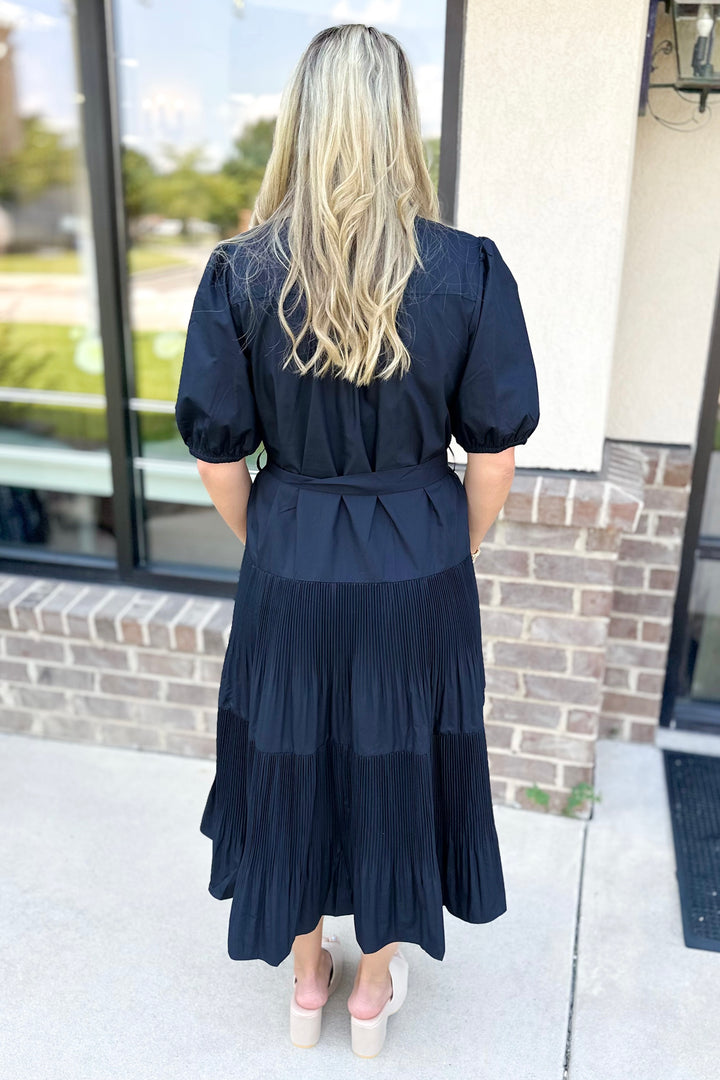 NAVY PLEATED TIERED BELTED MIDI DRESS