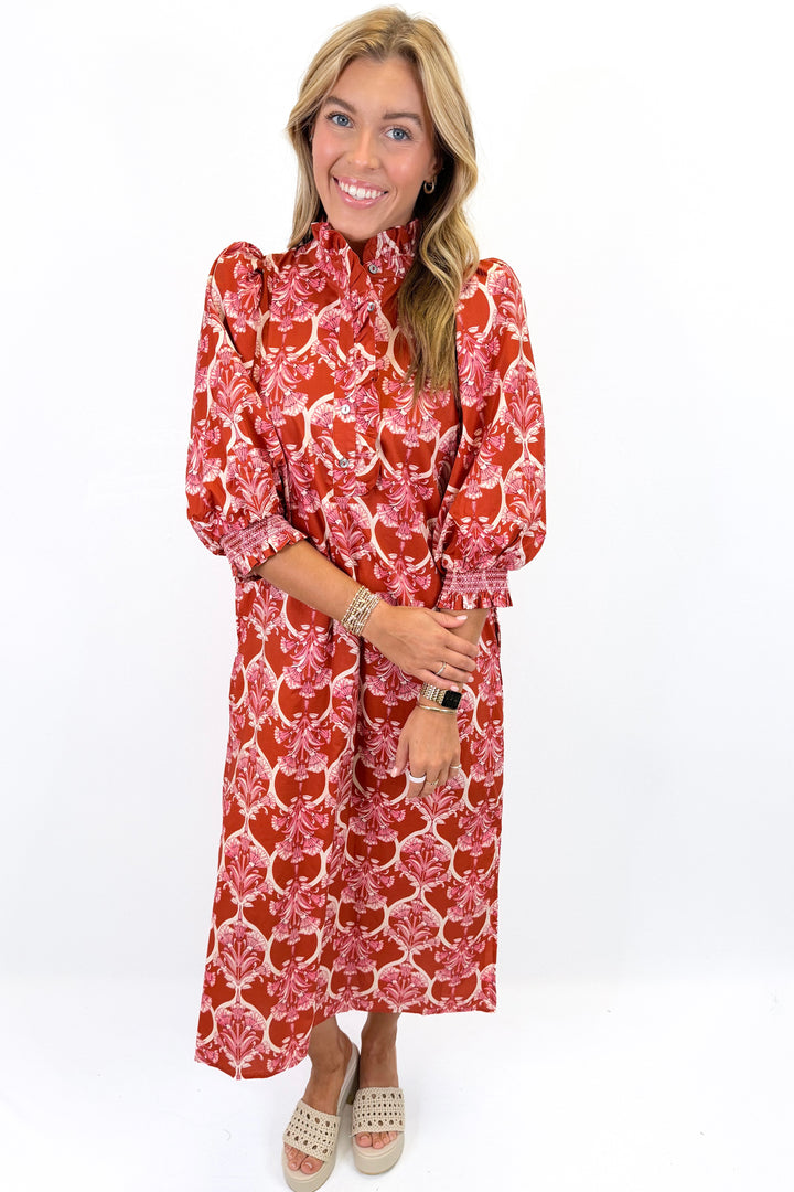 RUST PRINTED ELASTIC CUFF MIDI DRESS