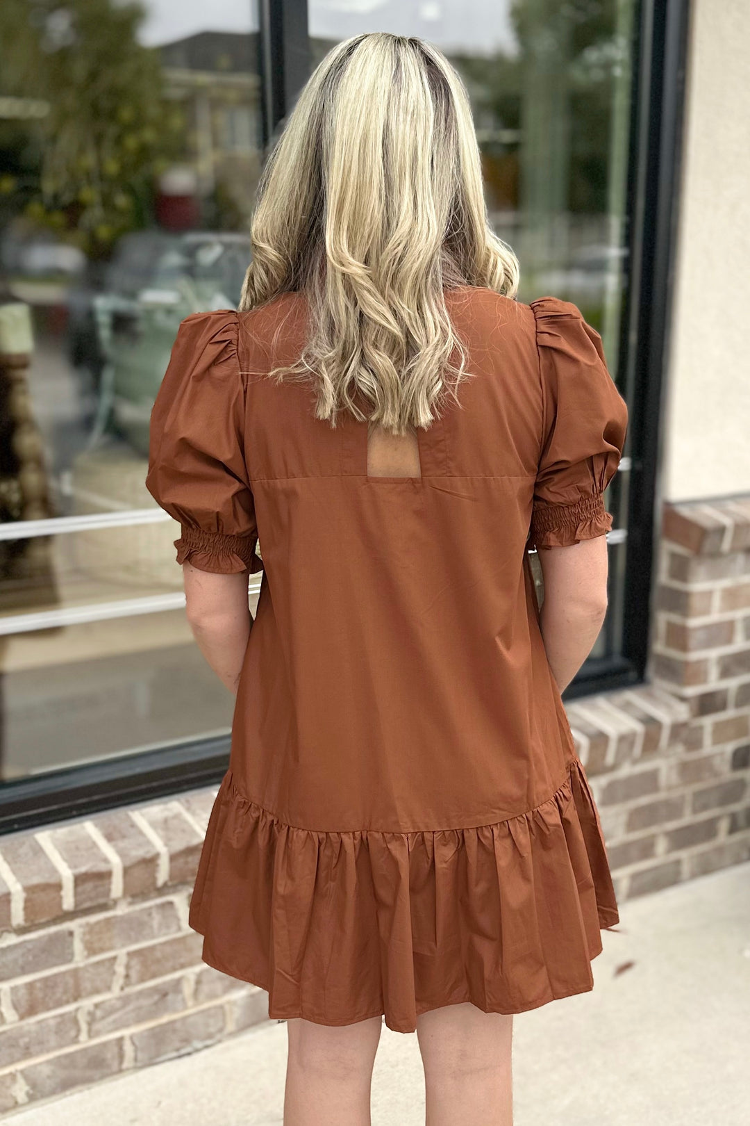 BROWN SMOCKED RUFFLE VNECK DROP HEM DRESS