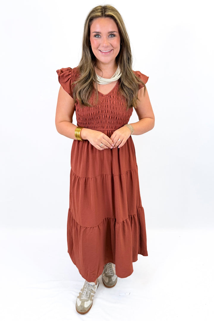 RUST SMOCKED FLUTTER SLEEVE MIDI DRESS