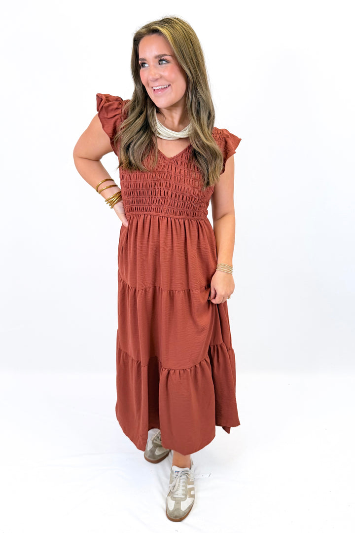 RUST SMOCKED FLUTTER SLEEVE MIDI DRESS