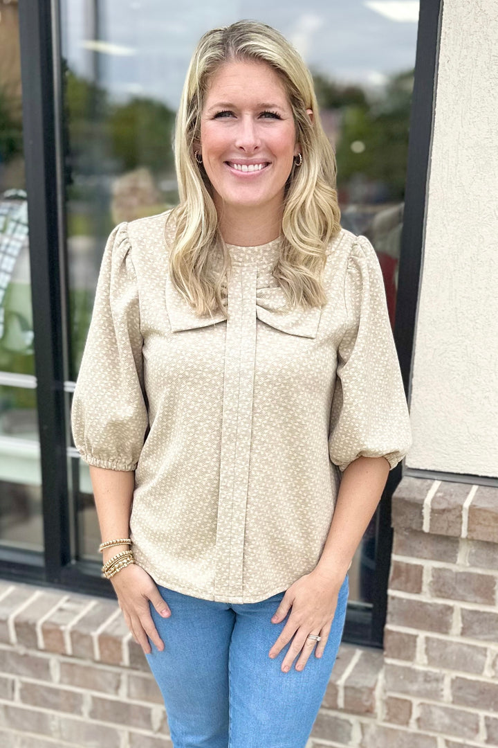 TAUPE TEXTURED BOW FRONT TOP