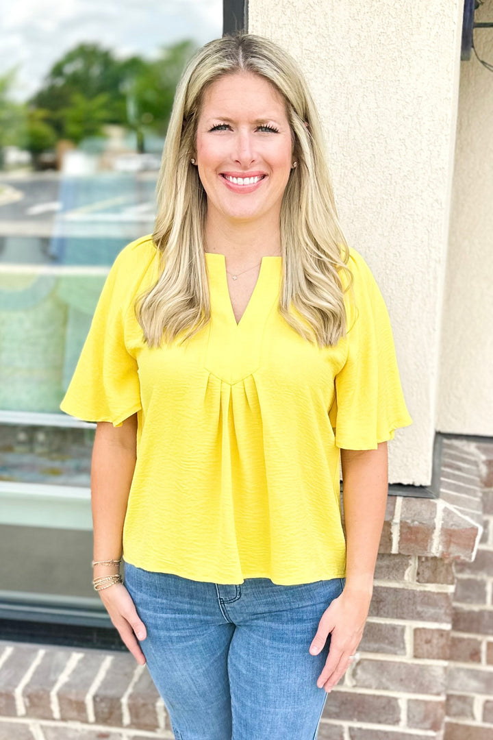 YELLOW VNECK PLACKET TOP