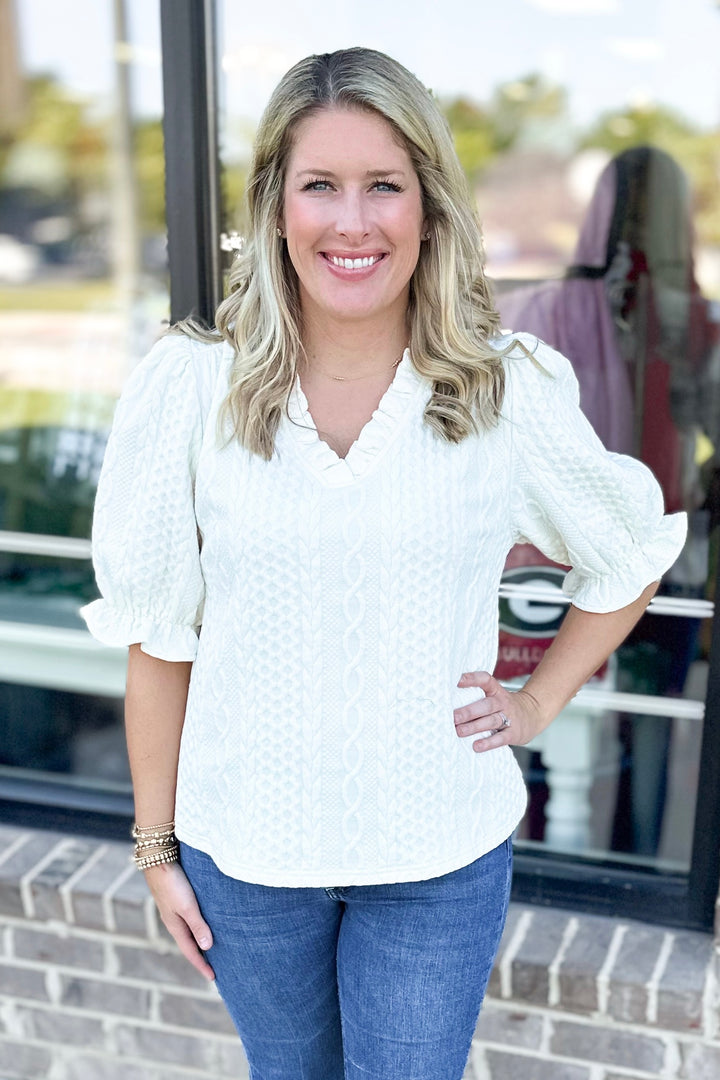 CREAM CABLE TEXTURED RUFFLE VNECK TOP