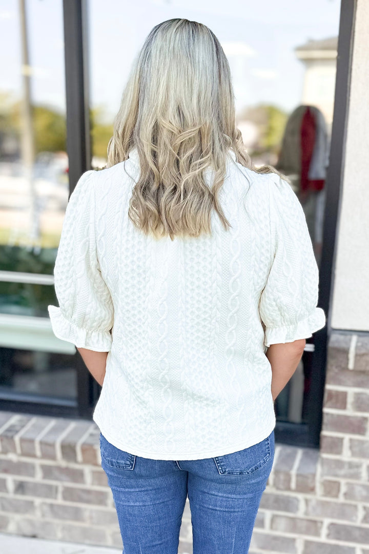 CREAM CABLE TEXTURED RUFFLE VNECK TOP