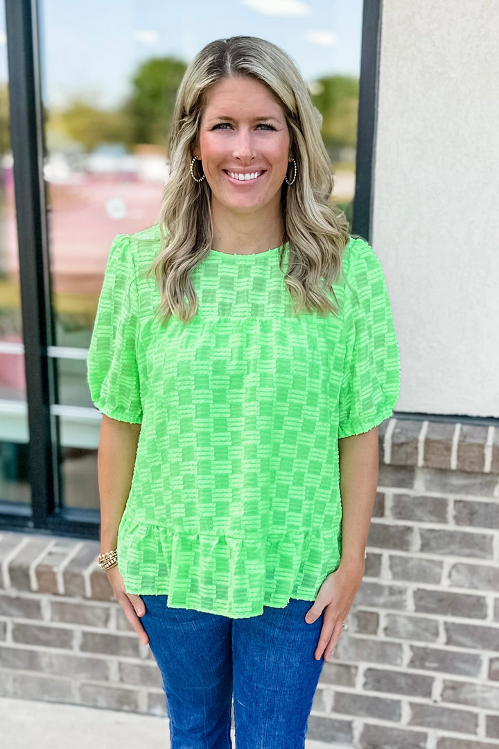 NEON GREEN TEXTURED RUFFLE HEM TOP