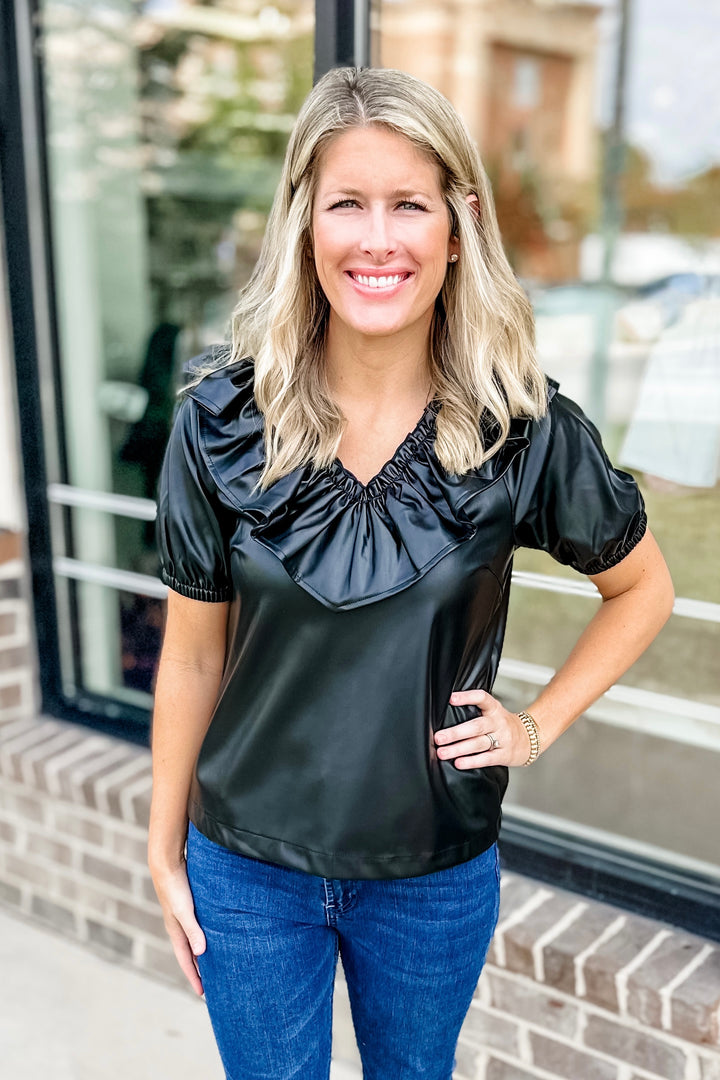 BLACK FAUX LEATHER RUFFLE VNECK TOP