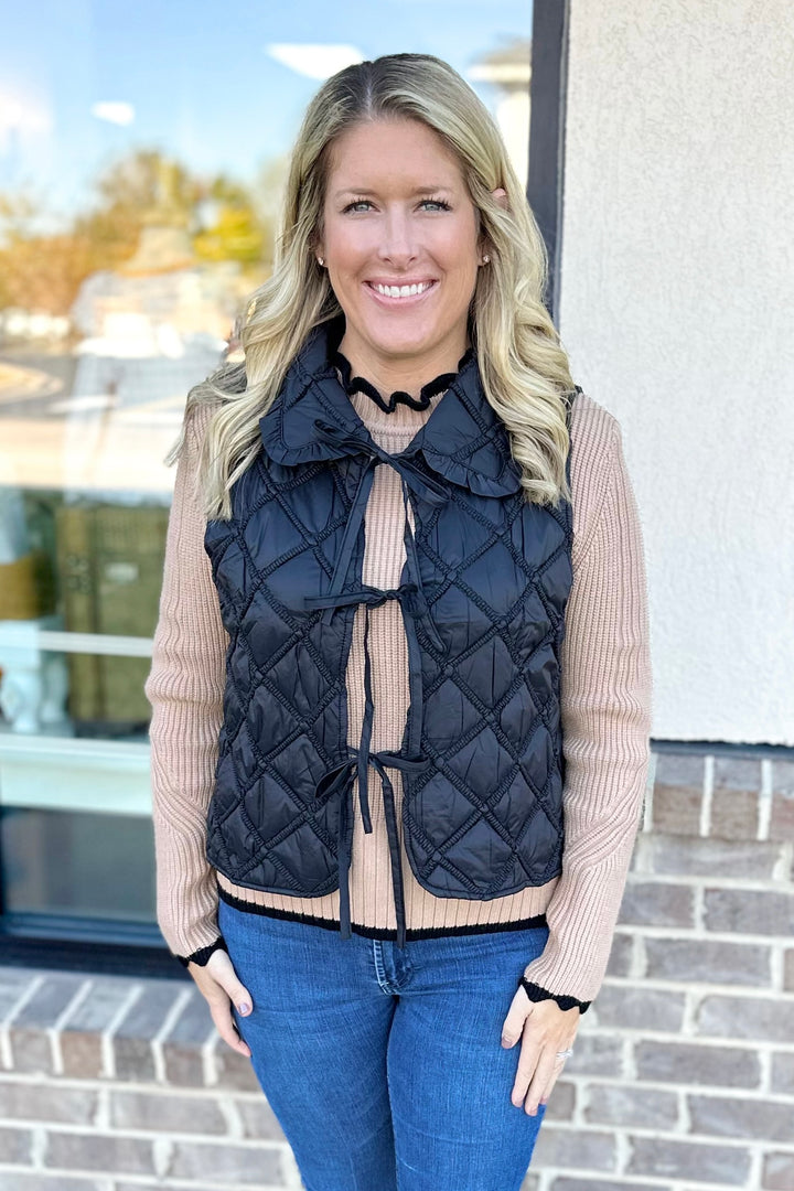 BLACK RUFFLE TRIM QUILTED VEST