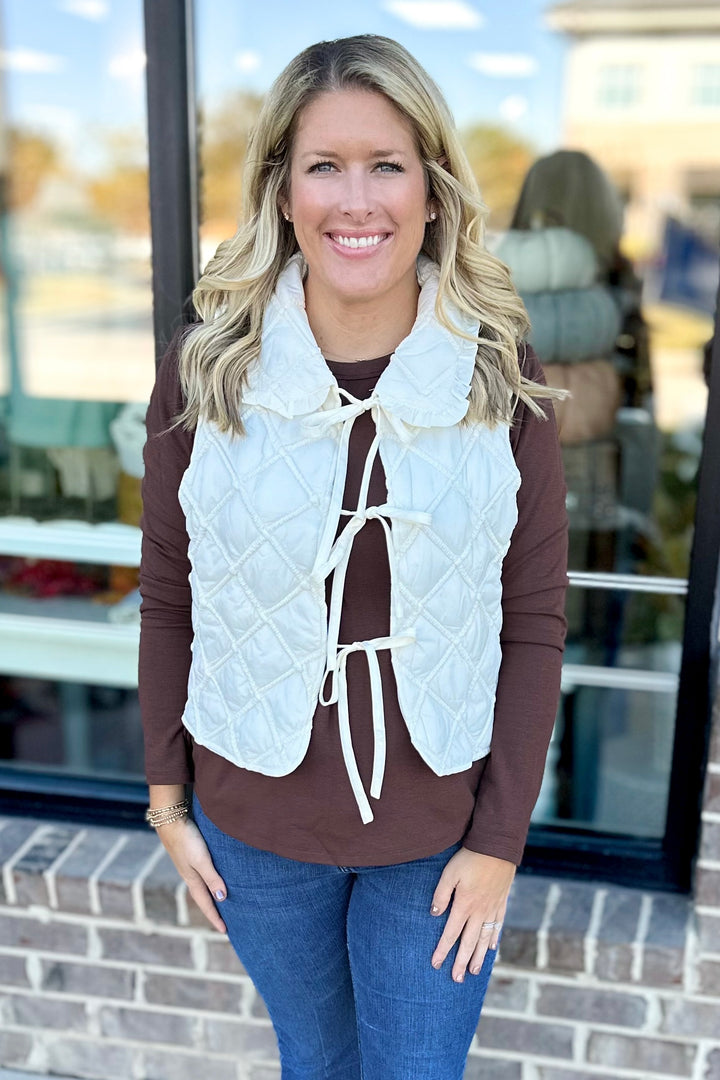 IVORY RUFFLE TRIM QUILTED VEST