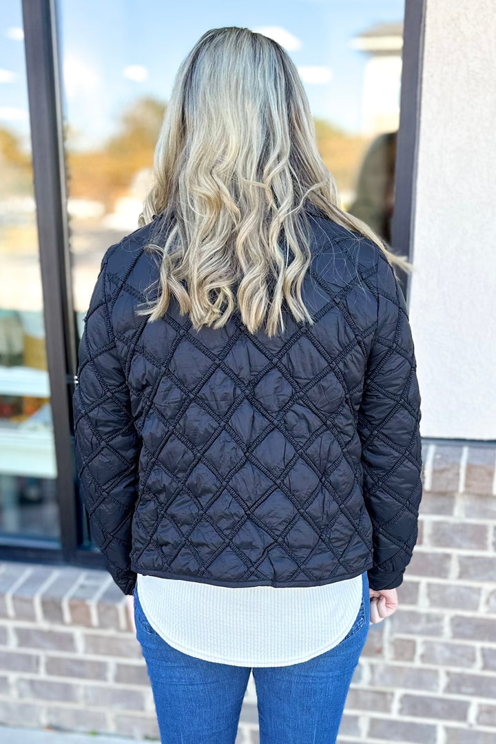 BLACK QUILTED RUFFLE TRIM JACKET