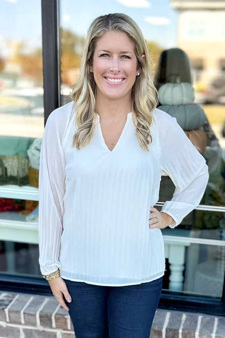 IVORY PLEATED LONG SLEEVE VNECK TOP