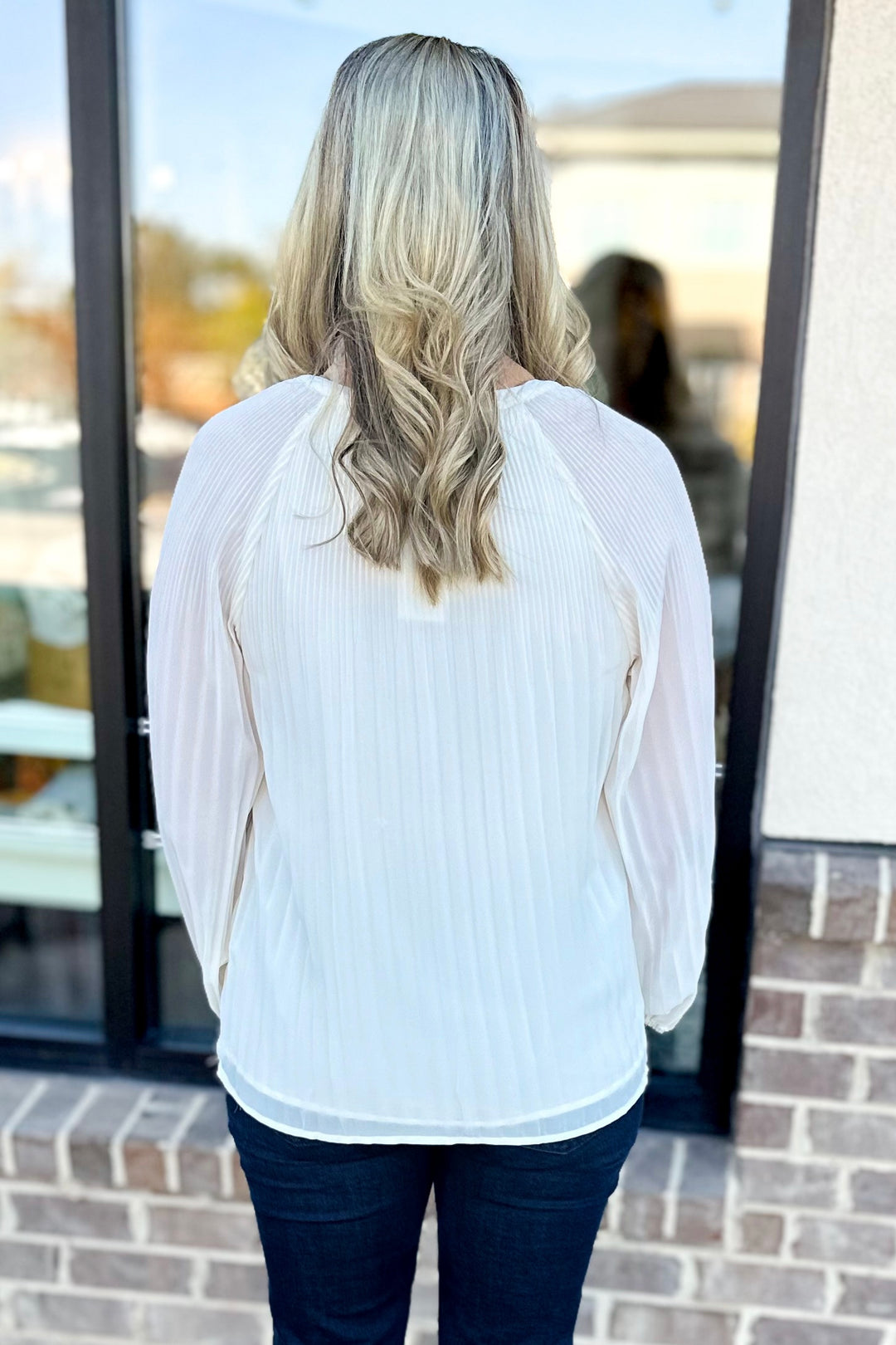 IVORY PLEATED LONG SLEEVE VNECK TOP