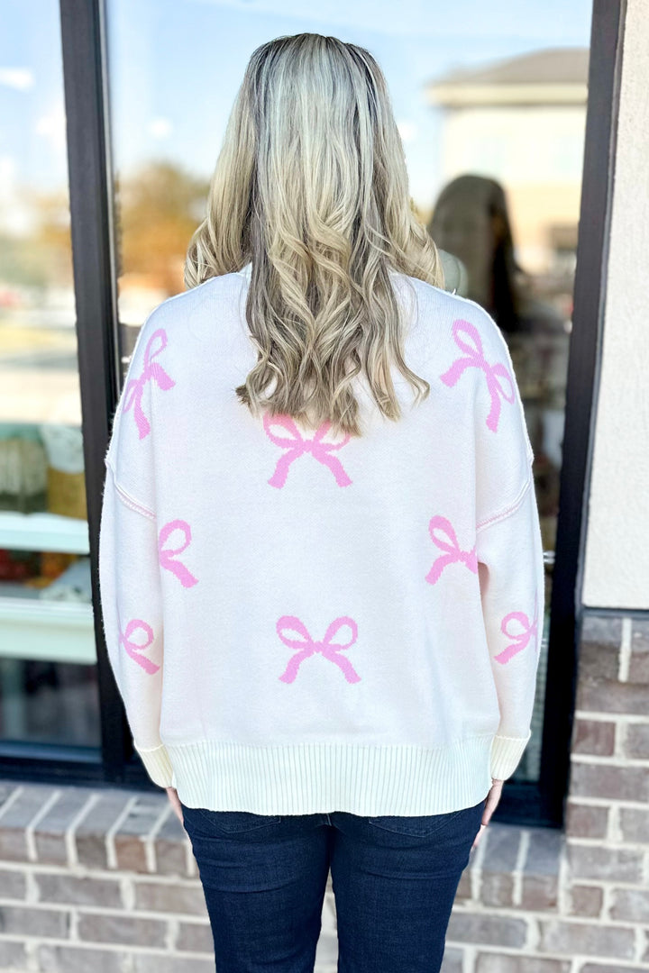 PINK & CREAM BOW PRINT SWEATER