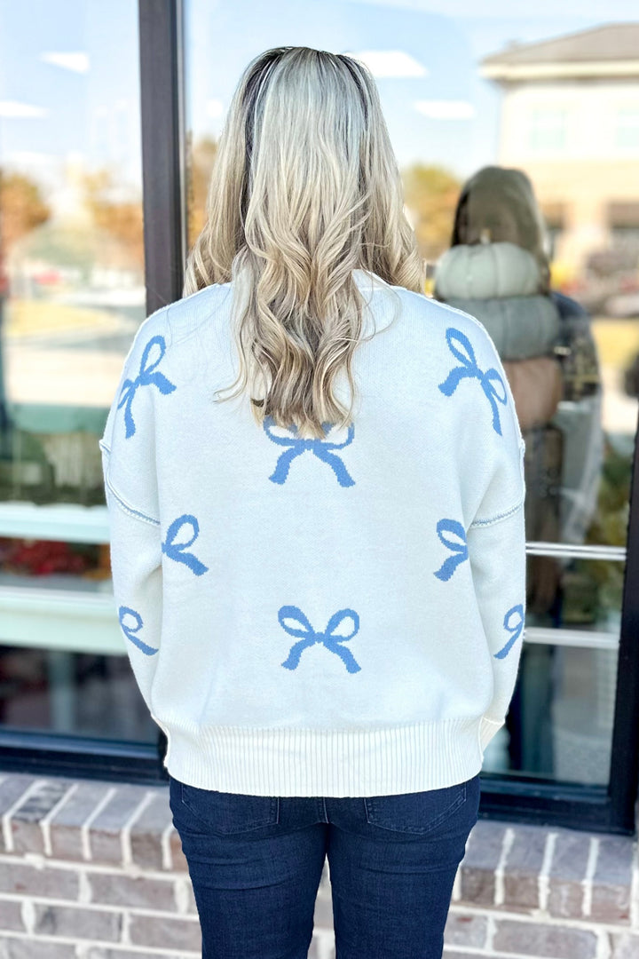 BLUE & CREAM BOW PRINT SWEATER