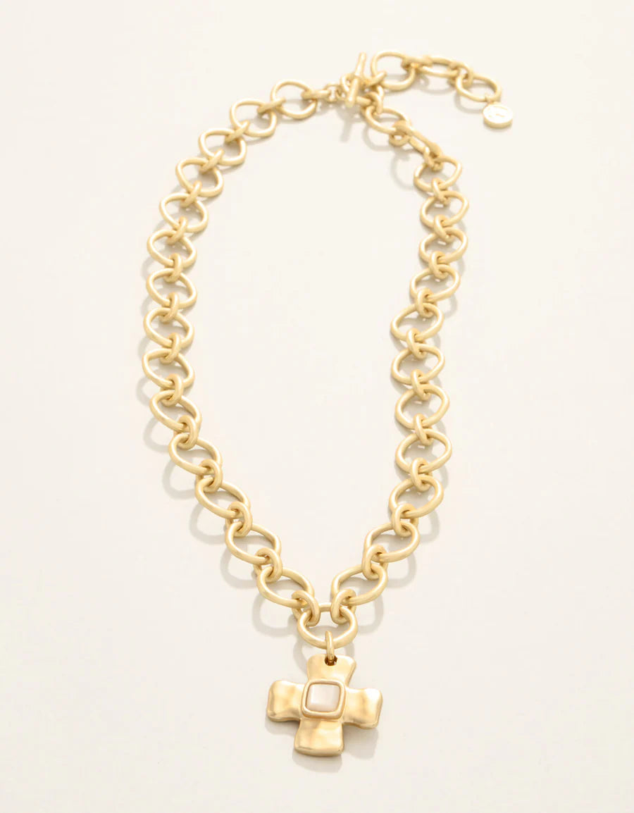 gold necklace with cross pendant