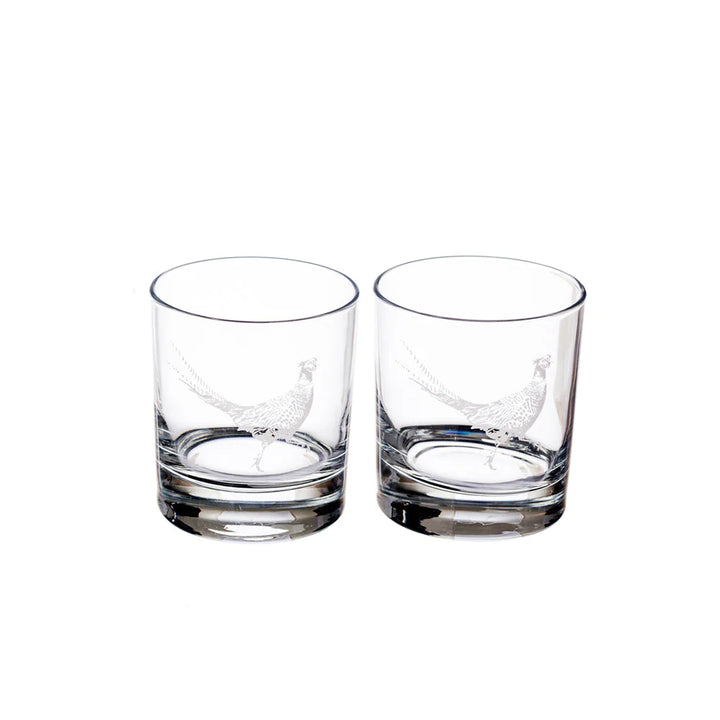 Two clear glass tumblers with engraved designs on a white background