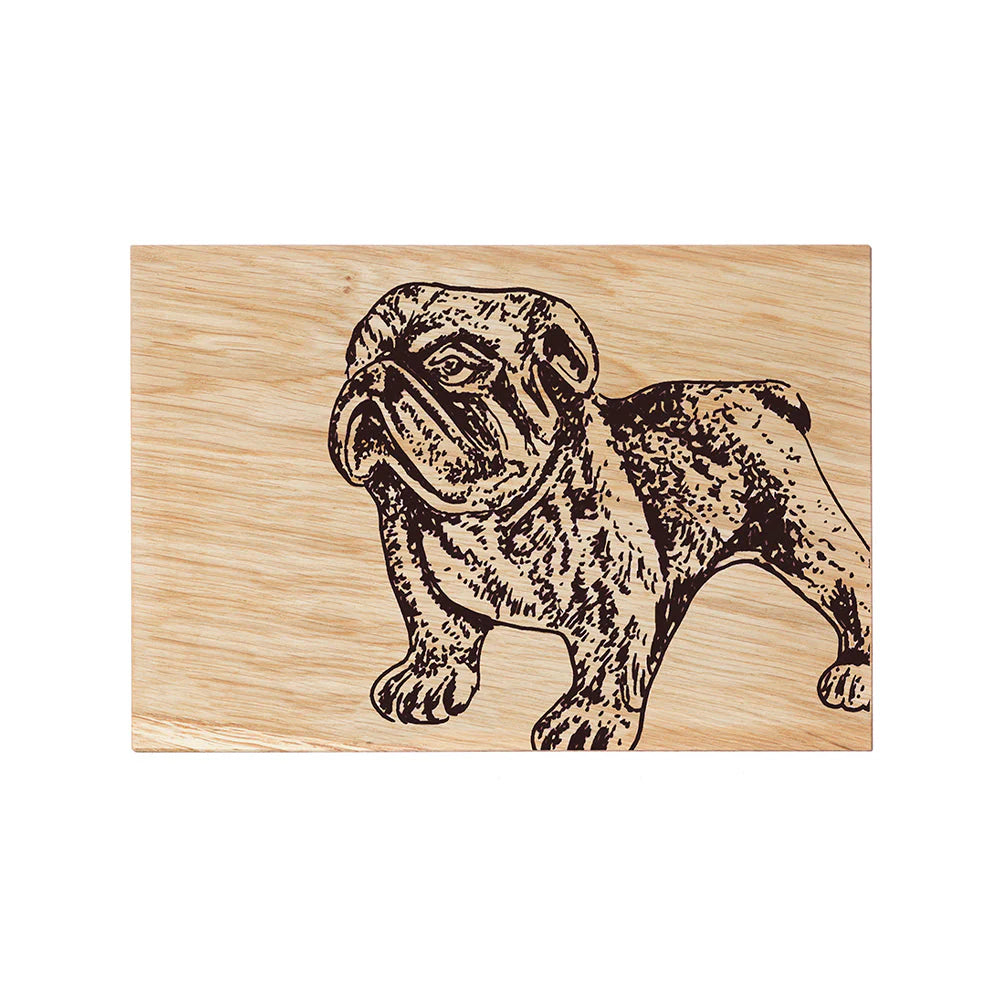 Wooden cutting board with a engraved bulldog design on a white background