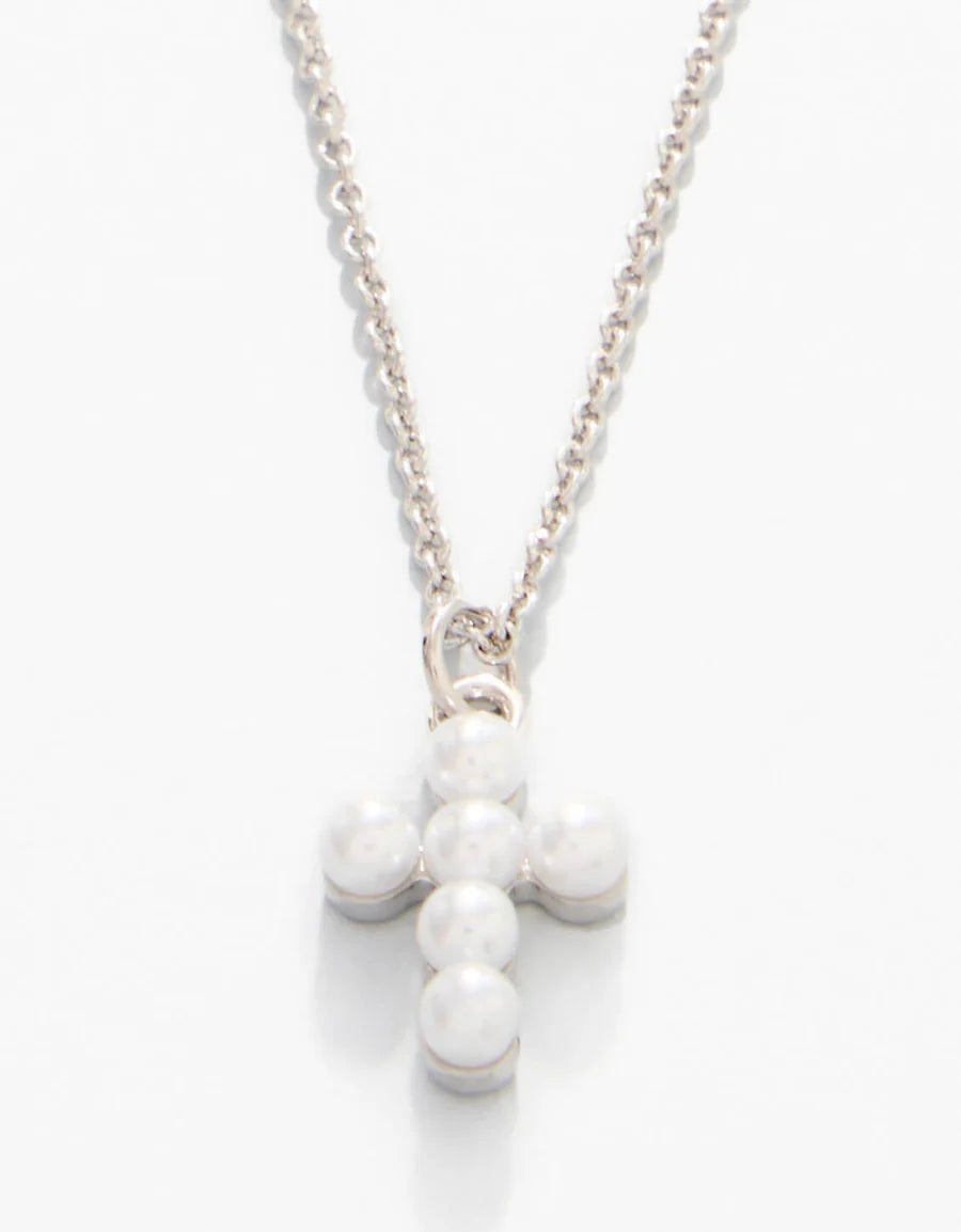 Necklace with a cross pendant on a white background
