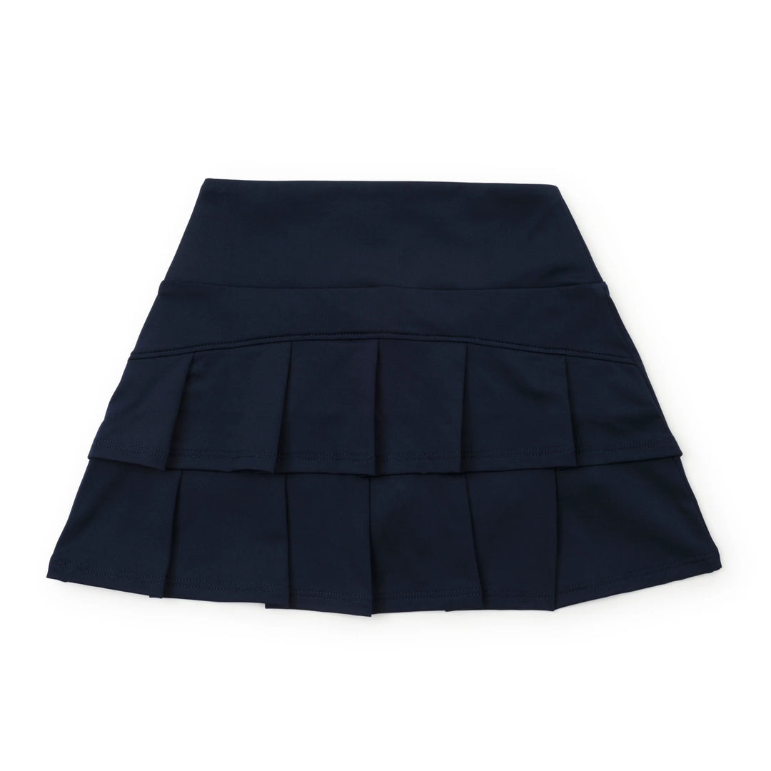 Navy blue pleated skirt on a white background