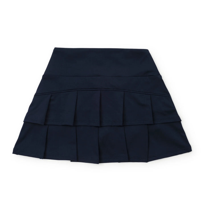 Navy blue pleated skirt on a white background