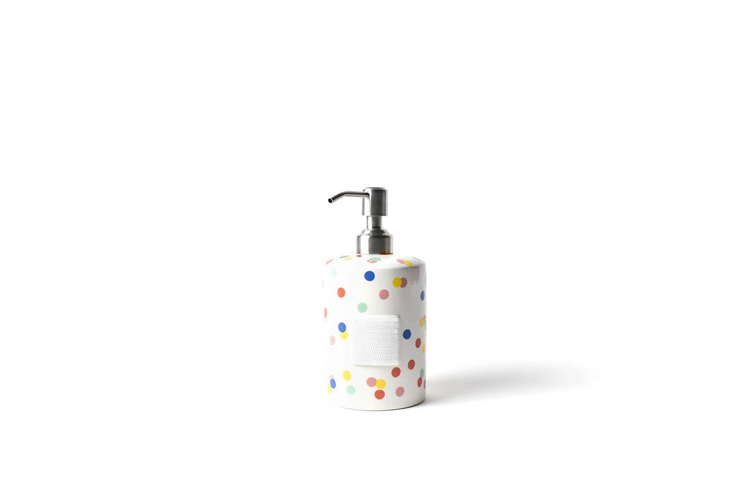 White soap dispenser with colorful polka dots on a white background