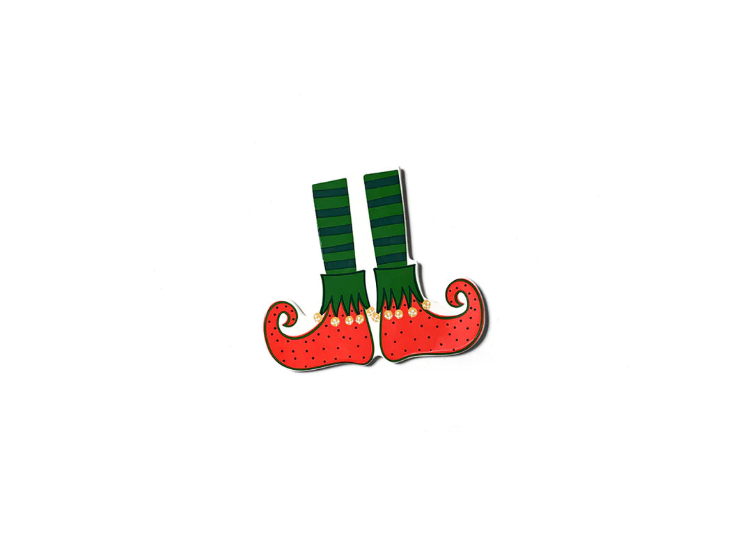 Pair of green elf legs with red shoes on a white background