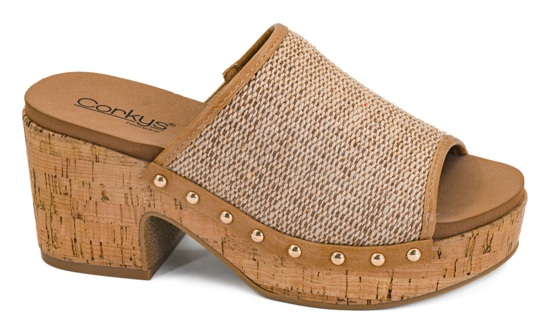 Beige sandal with cork sole on a white background