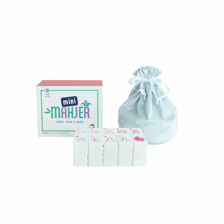 Mini Mahjer game box with playing tiles and drawstring storage bag on a white background. | Walker Boutique