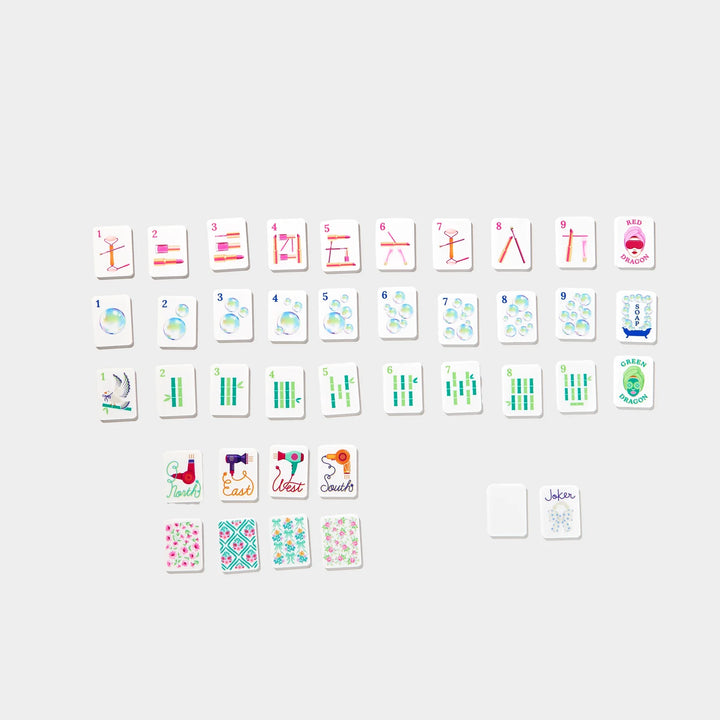 Mini Mahjer playing tile set with numbered suits, dragons, winds, flowers, and joker tile. | Walker Boutique