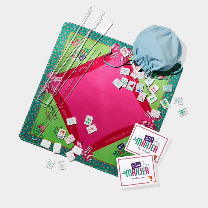 Mini Mahjer travel game set with playing mat, tiles, racks, storage bag, and cards. | Walker Boutique