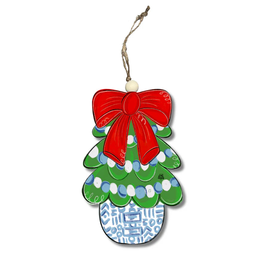Decorative Christmas tree ornament with a red bow on a white background