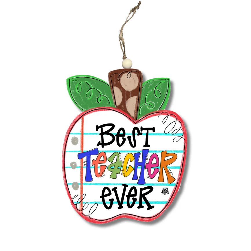 A decorative apple-shaped hanging ornament with green leaves, a brown stem, and the phrase 'Best Teacher Ever' in colorful lettering on a lined paper background, shown on a plain white background.