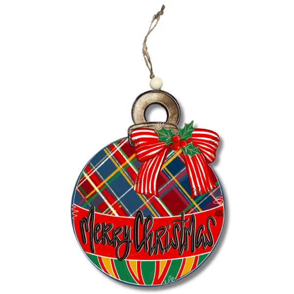 A round Christmas ornament with a red and green tartan plaid pattern, a red and white striped bow with holly, and 'Merry Christmas' written across the front, hanging from a jute string.