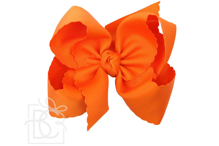 ORANGE SCALLOPED EDGE BOW