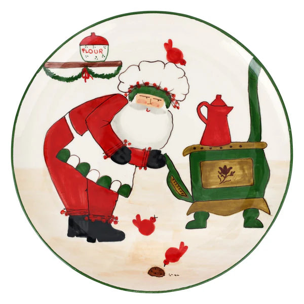 Decorative plate with a hand painted Santa Claus character in a kitchen setting.