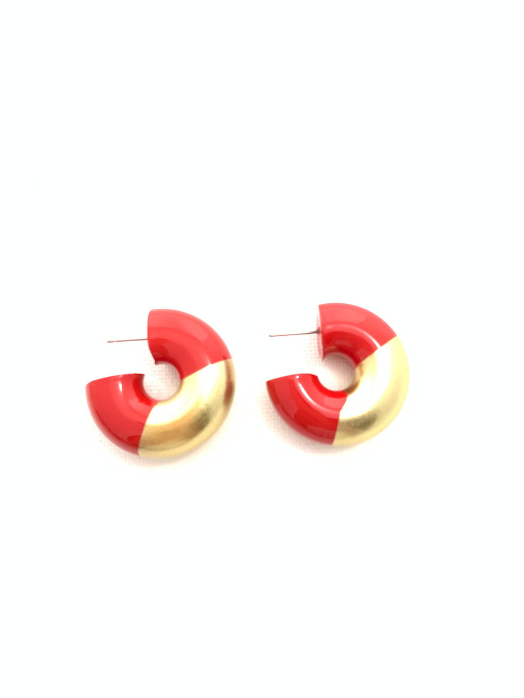 A pair of modern, curved C-shaped earrings in glossy red and metallic gold, shown on a plain white background.