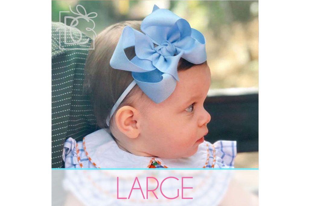 large bow on baby