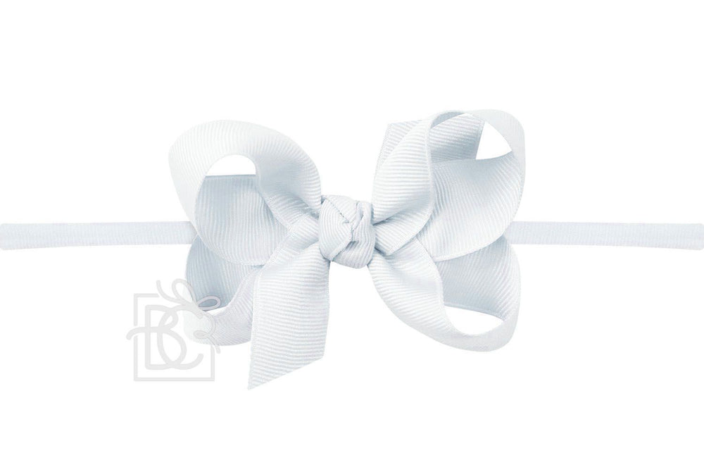A powder blue pantyhose headband with a bow