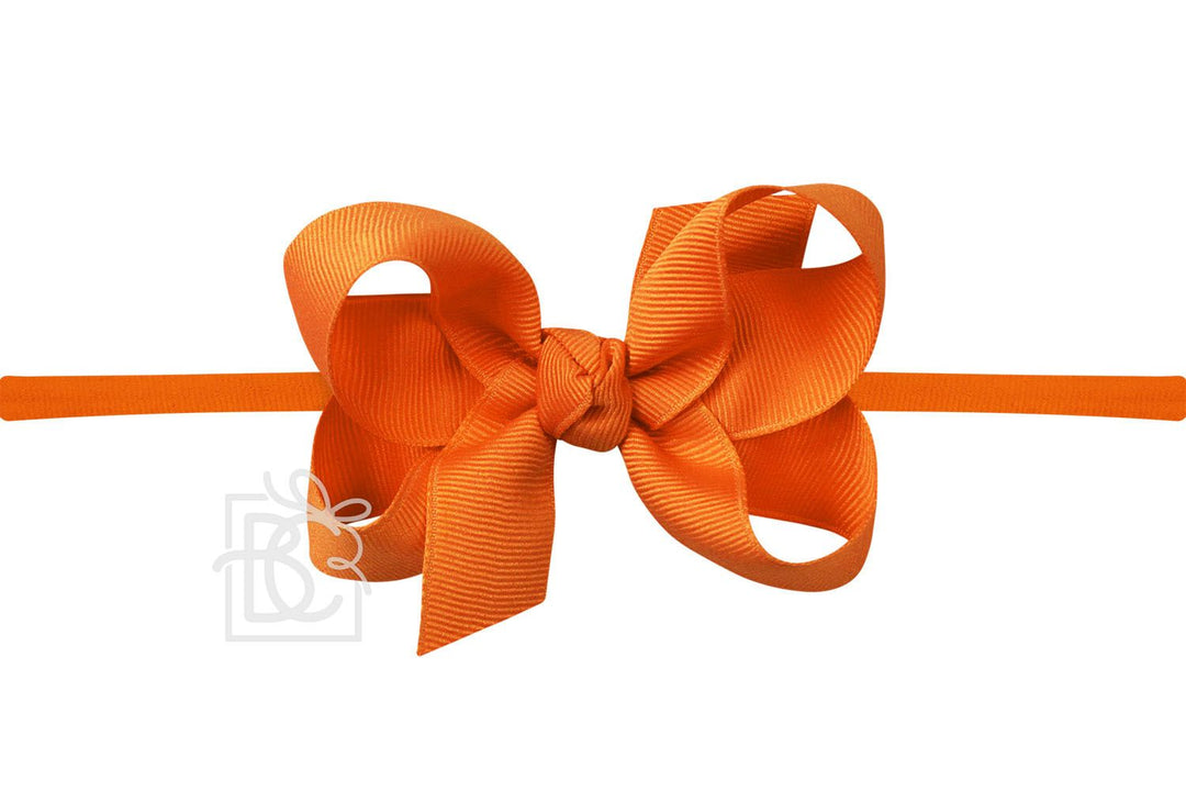 ORANGE PANTYHOSE HEADBAND WITH BOW