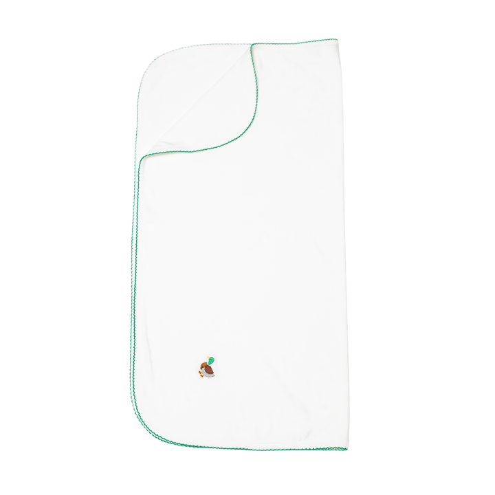 White baby blanket with green trim and embroidered mallard design on a white background