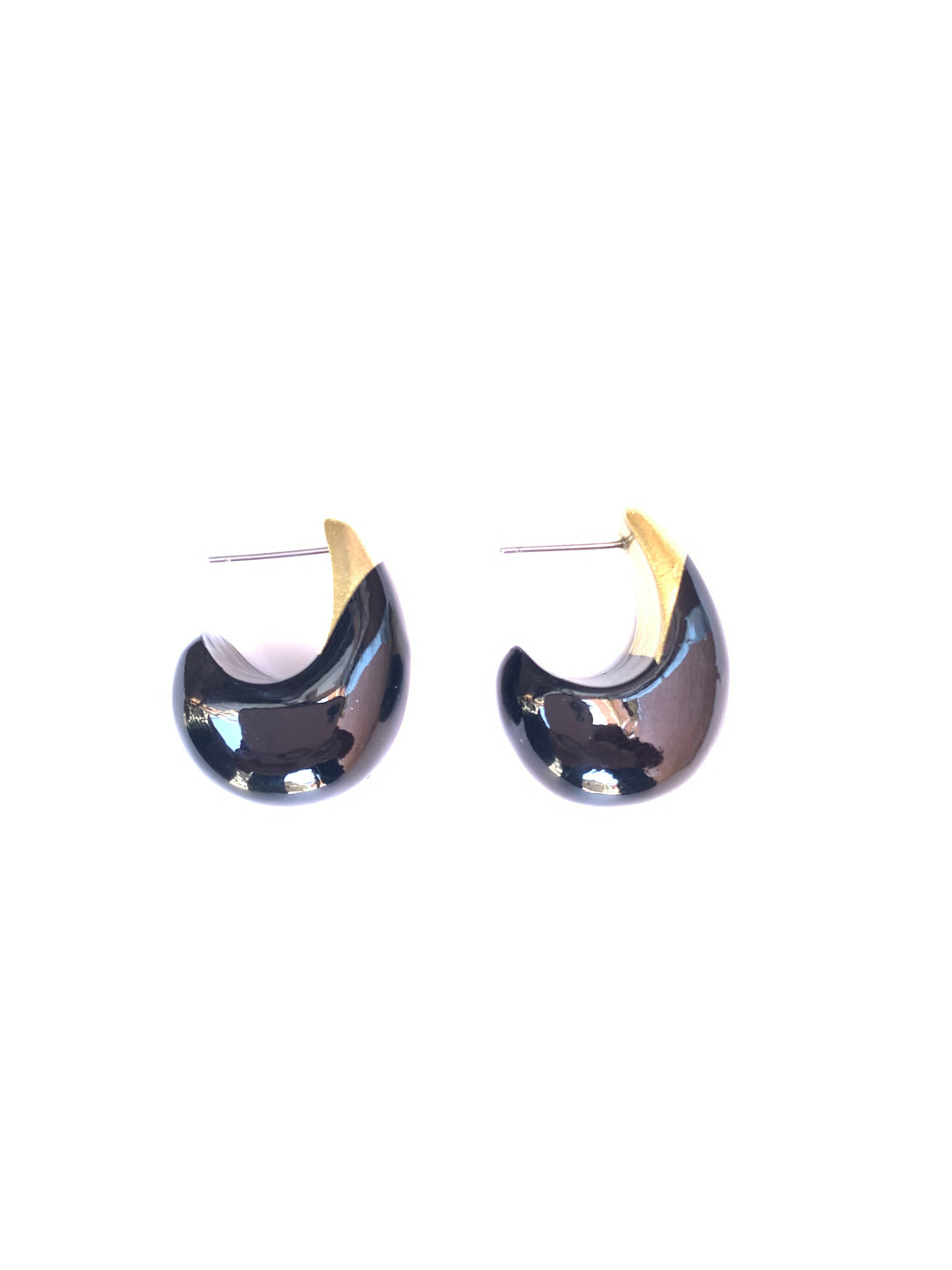 A pair of crescent-shaped earrings with a glossy black finish and a gold-toned beak-like accent, shown on a plain white background.