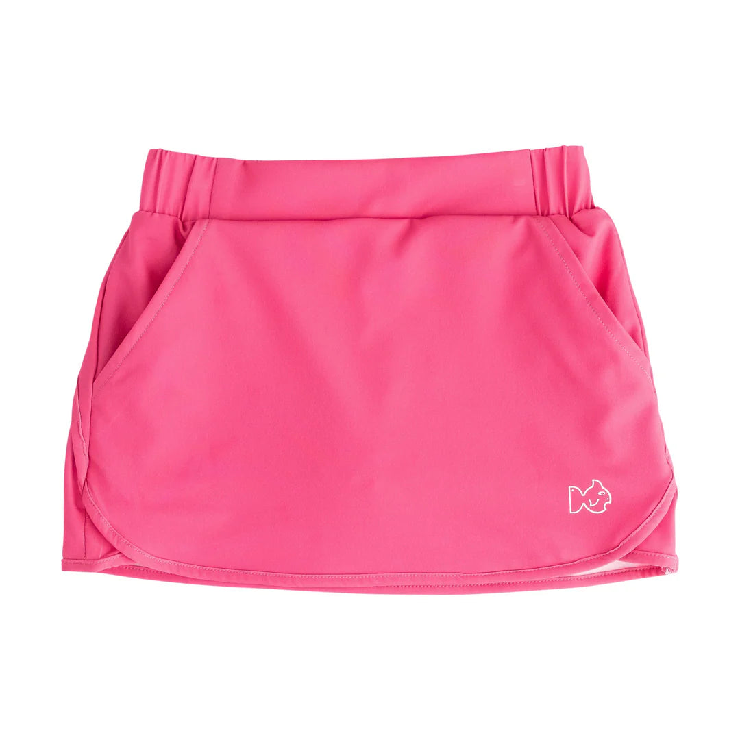 HOT PINK GIRLS GOLF SKORT ON WHITE BACKGROUND